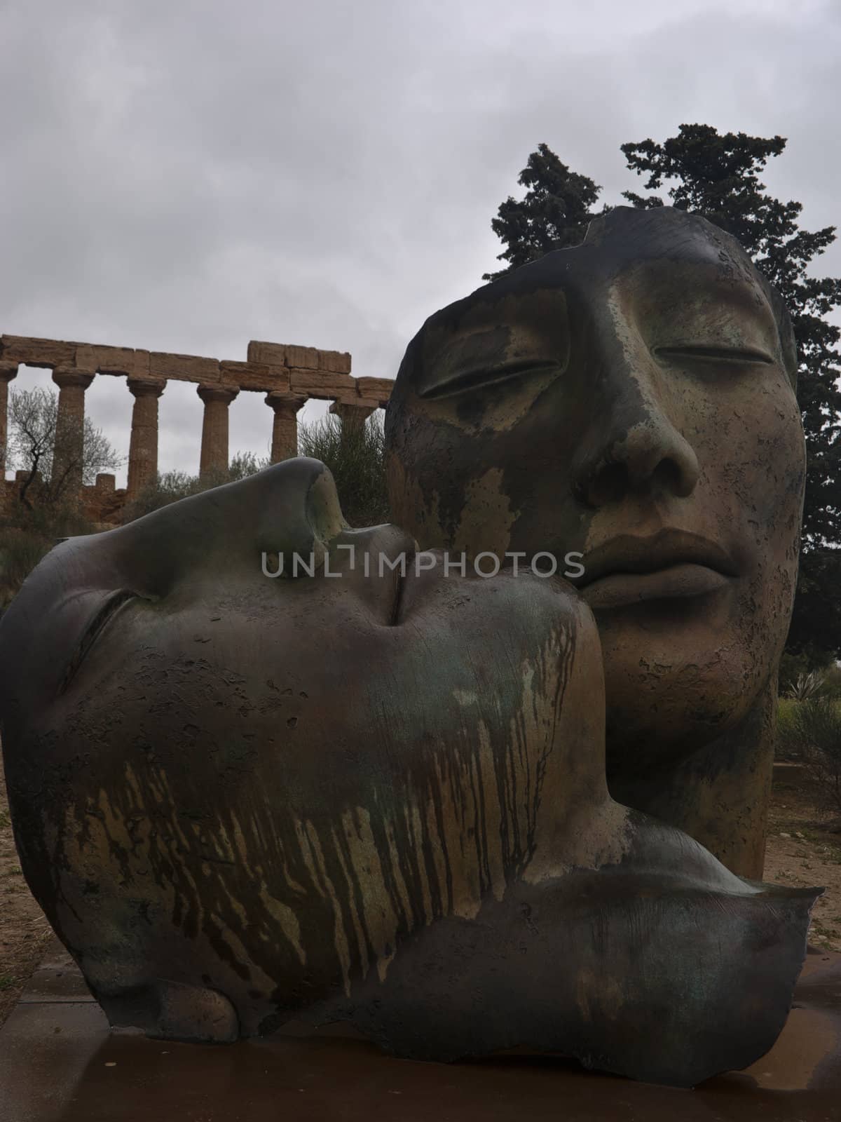 Greek temple of Agrigento with modern sculture. Sicily- Italy