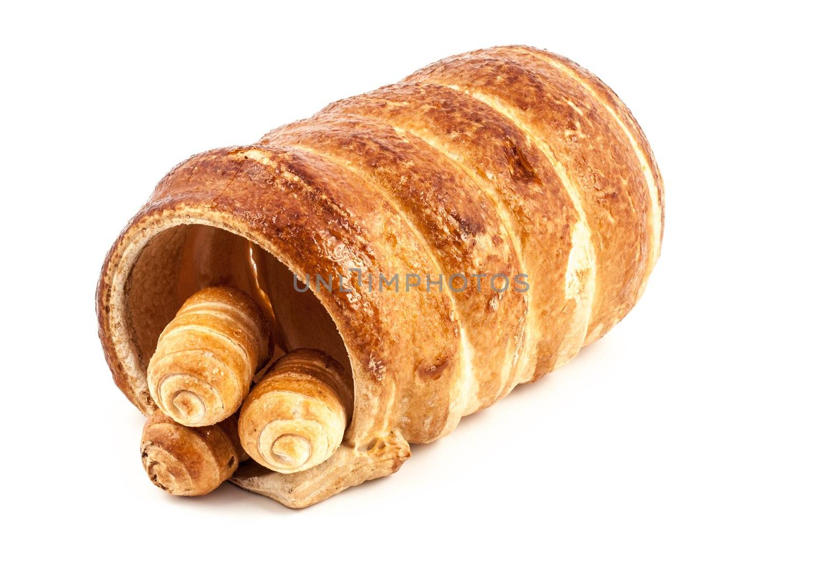 Three empty typical italian cannoli pastry and a big one on white background