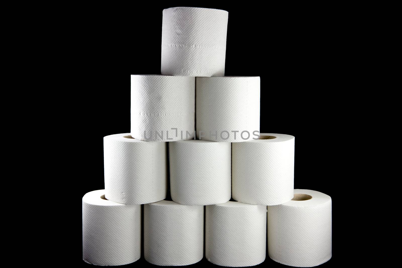 Picture of a bunch of toilet paper rolls formed as a pyramid