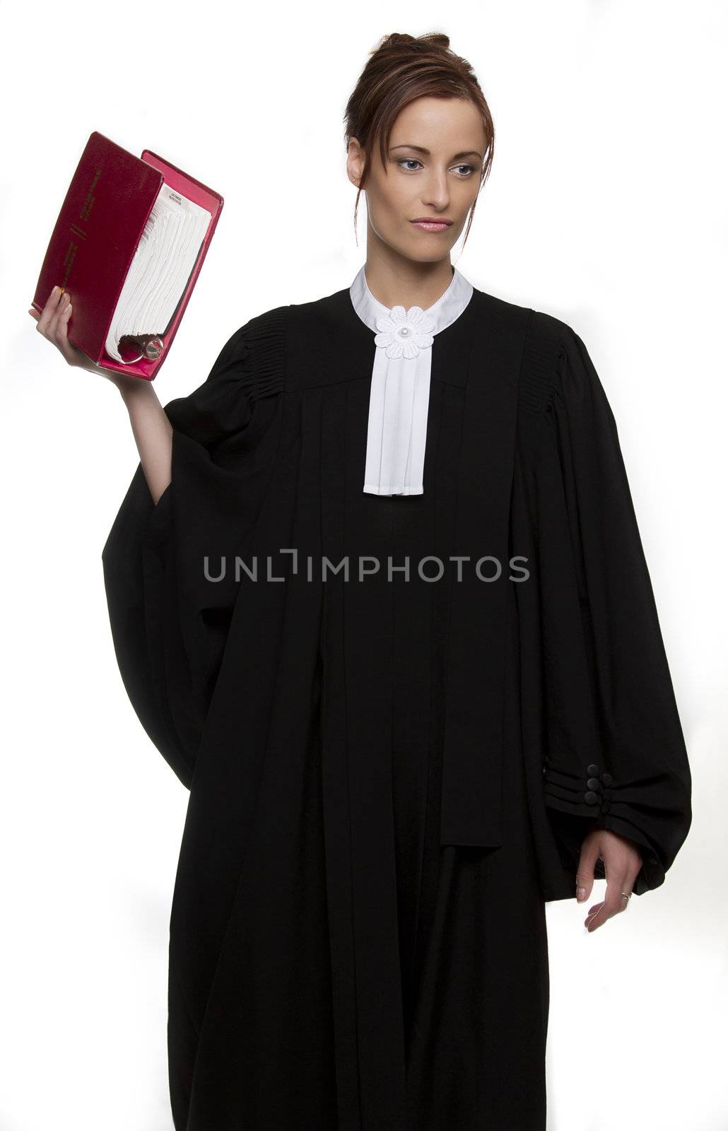 Women dress as a canadian attorney, holding a red book of law