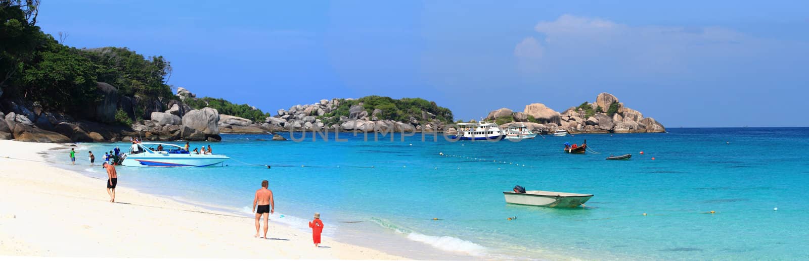 traveller walking on white sand beach at Similan island national park Andaman Thailand