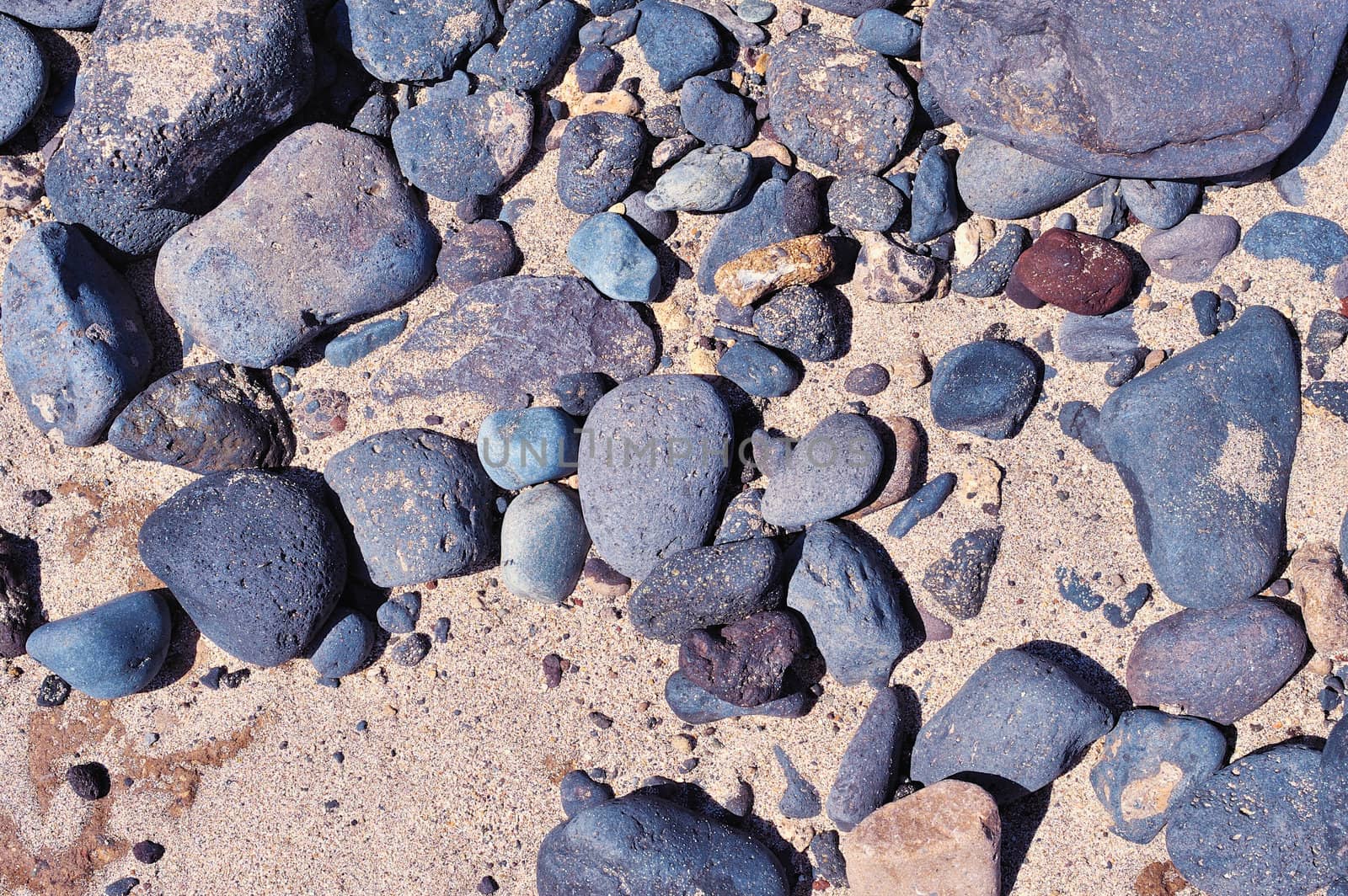 Sea beach. Natural small pebbles on the coast