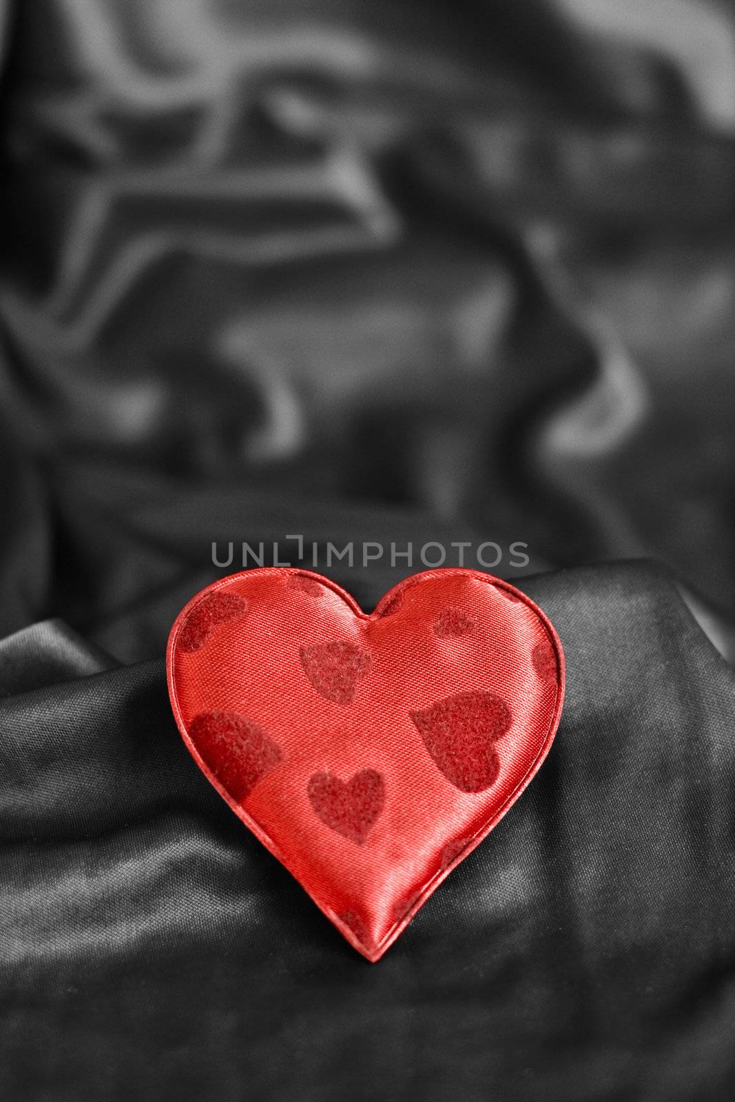 background with a heart shape and silk