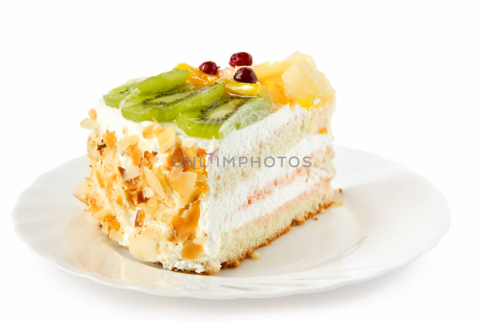 Birthday cake with cream with fruit on the white background