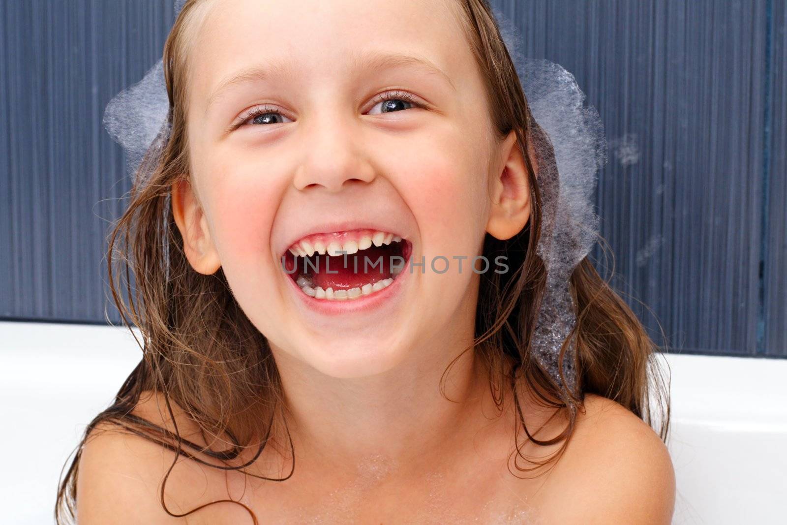 the girl is happy in the swimming bath