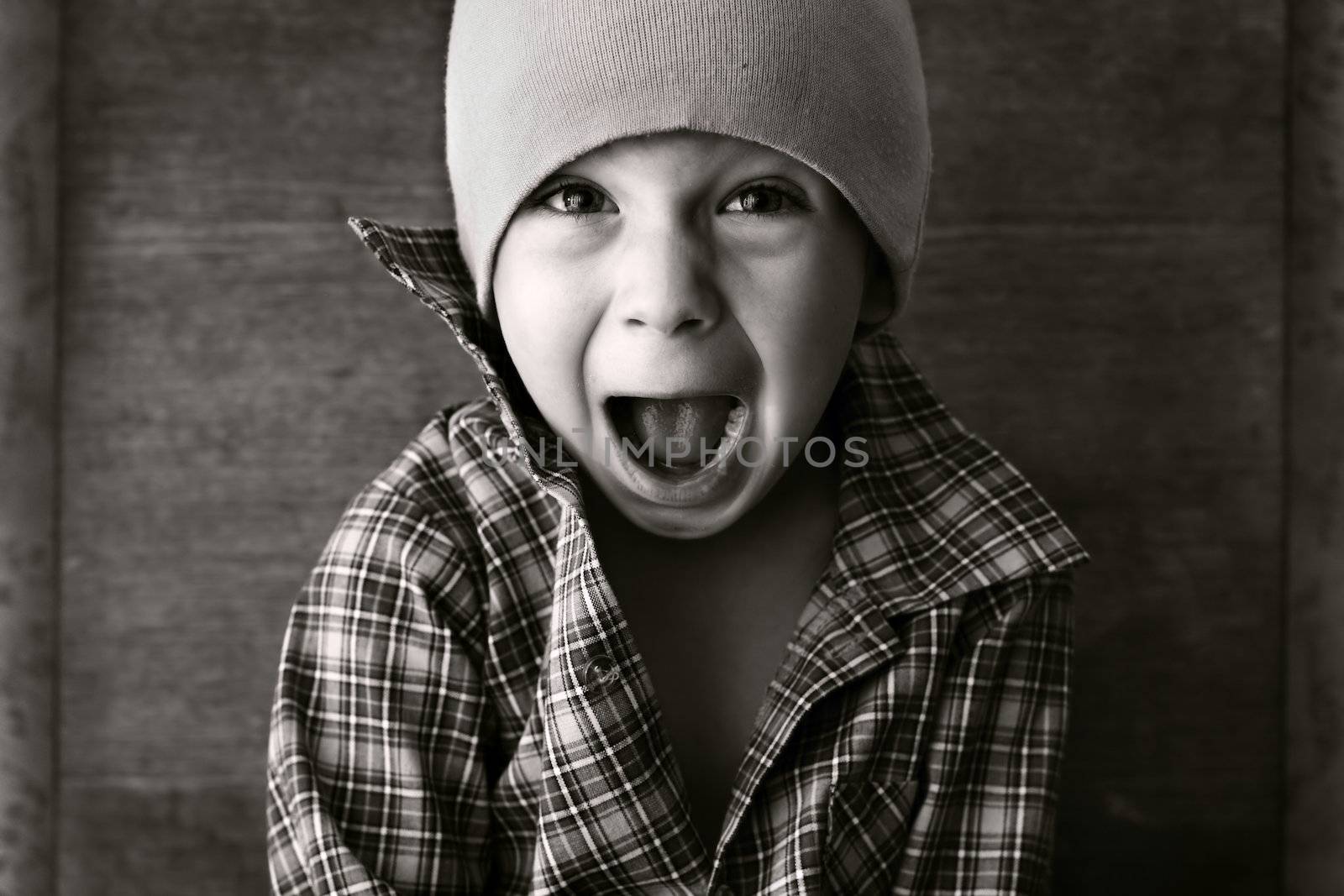 boy in the hat shouted, black and white photography