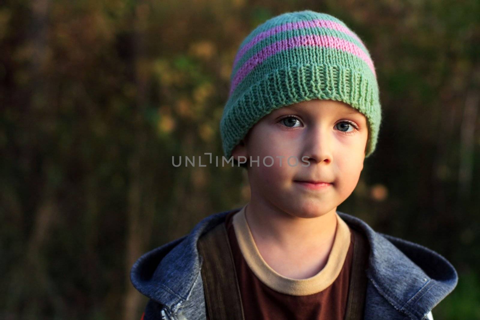 boy in a cap on the nature, autumn