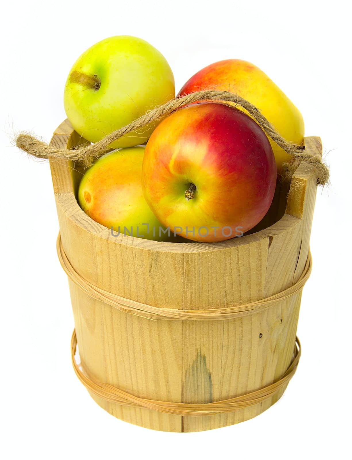Wood basket with apples on white background