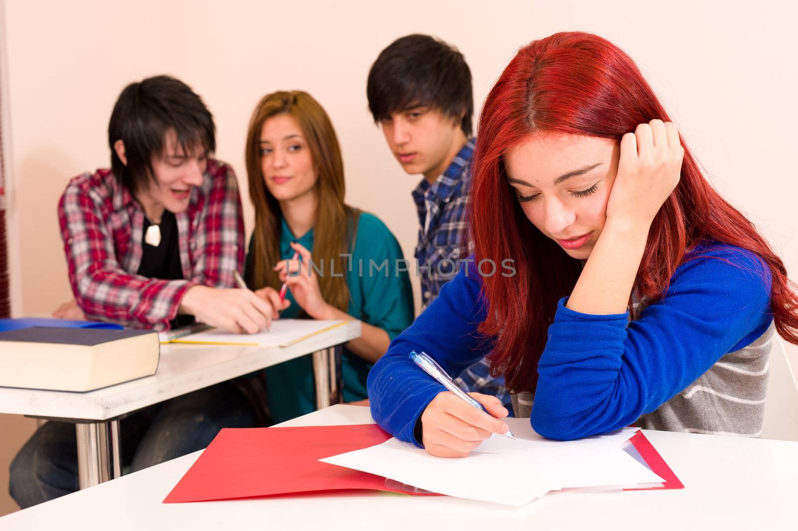 Her bully classmates exlcuding her from the group