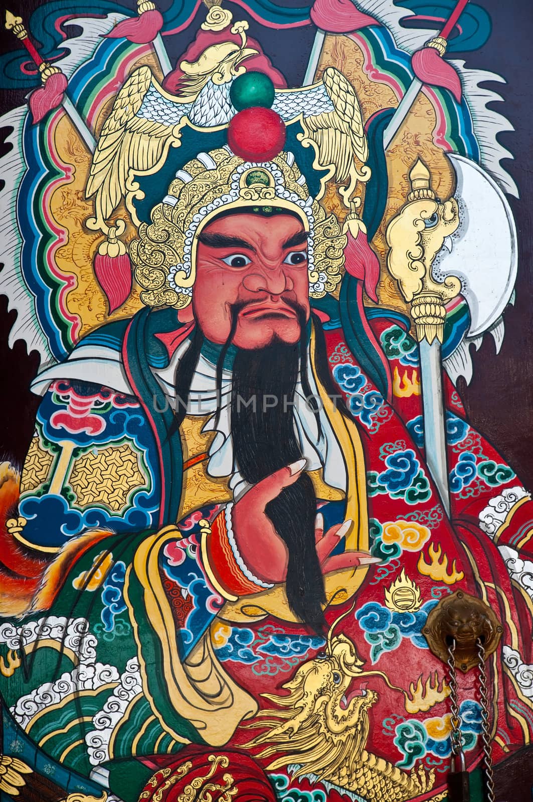 Traditional type of temple gate in China Town Thailand. God of China on the door