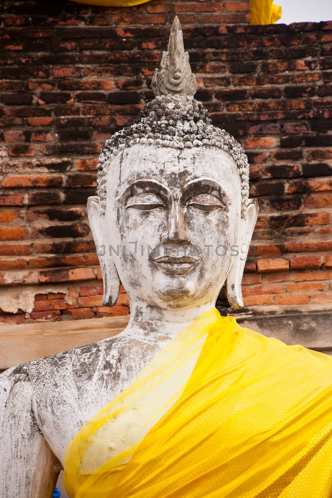 Sitting Buddha statue in Wat Phra Si Rattana Mahathat Temple Ayutthaya , Thailand.