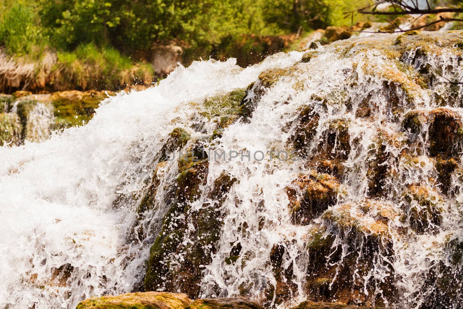 Close up of a waterfall, Krka national park, Croatia by Lamarinx