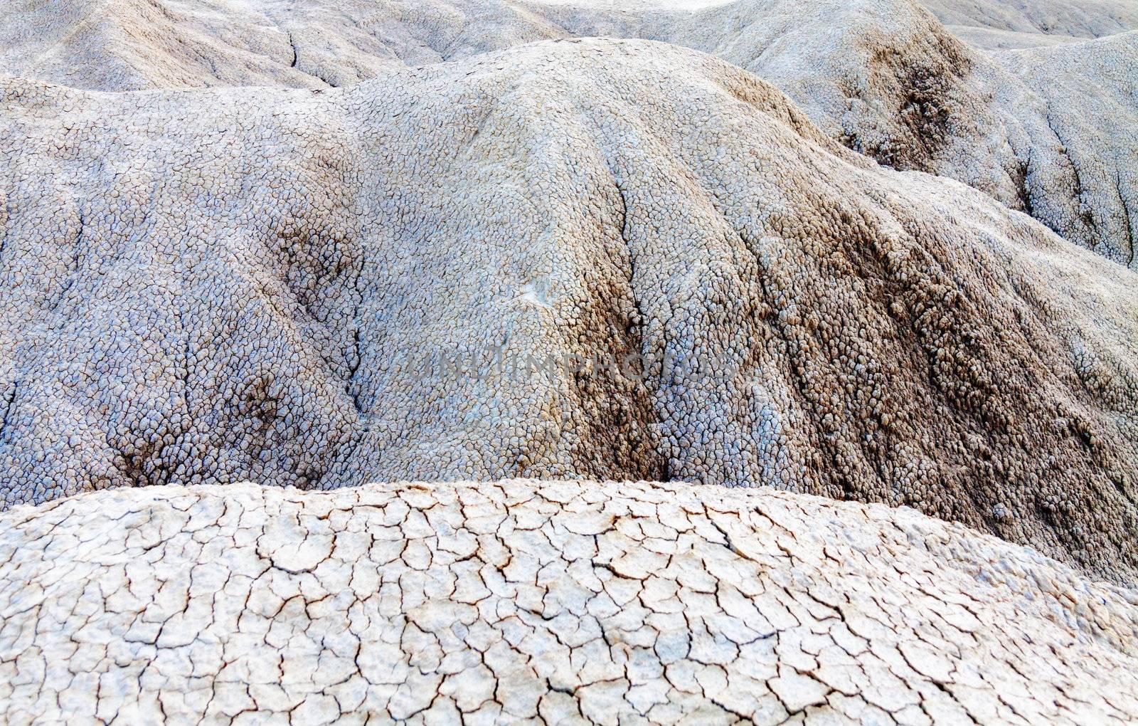 Cracked soil near the mud volcanoes in Buzau, Romania by Lamarinx