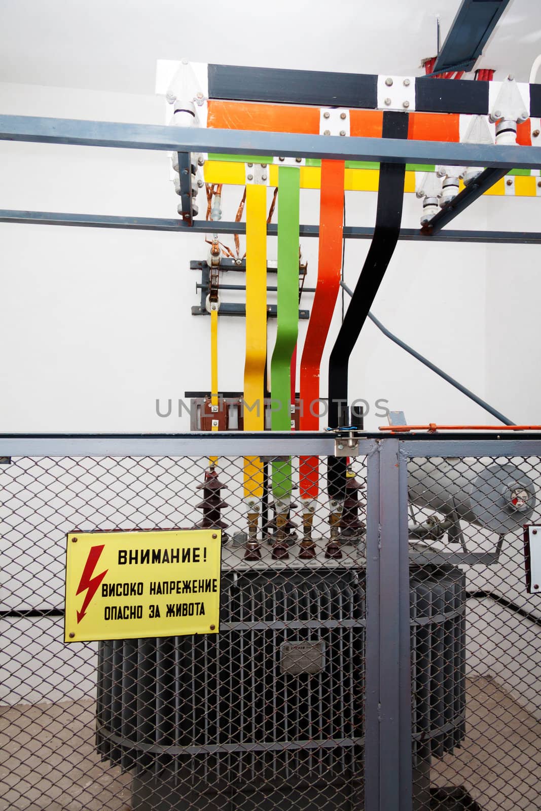 High voltage transformator with warning sign