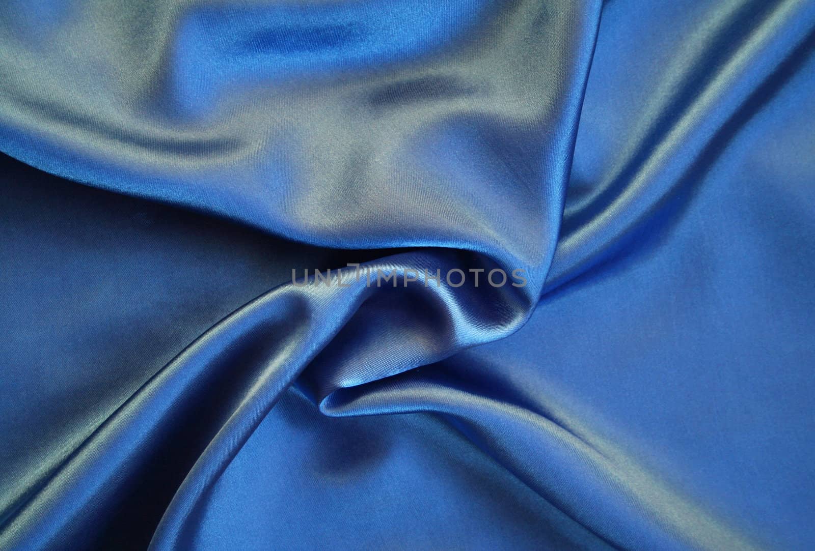 Smooth elegant blue silk as background 