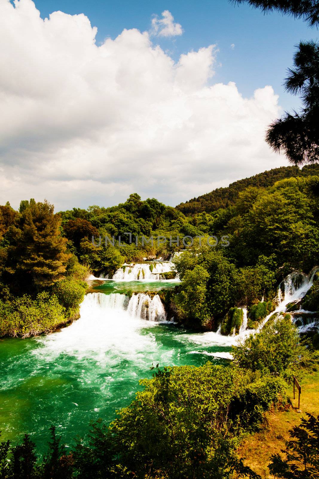Cascade of waterfalls with emerald pond, Krka national park, Cro by Lamarinx