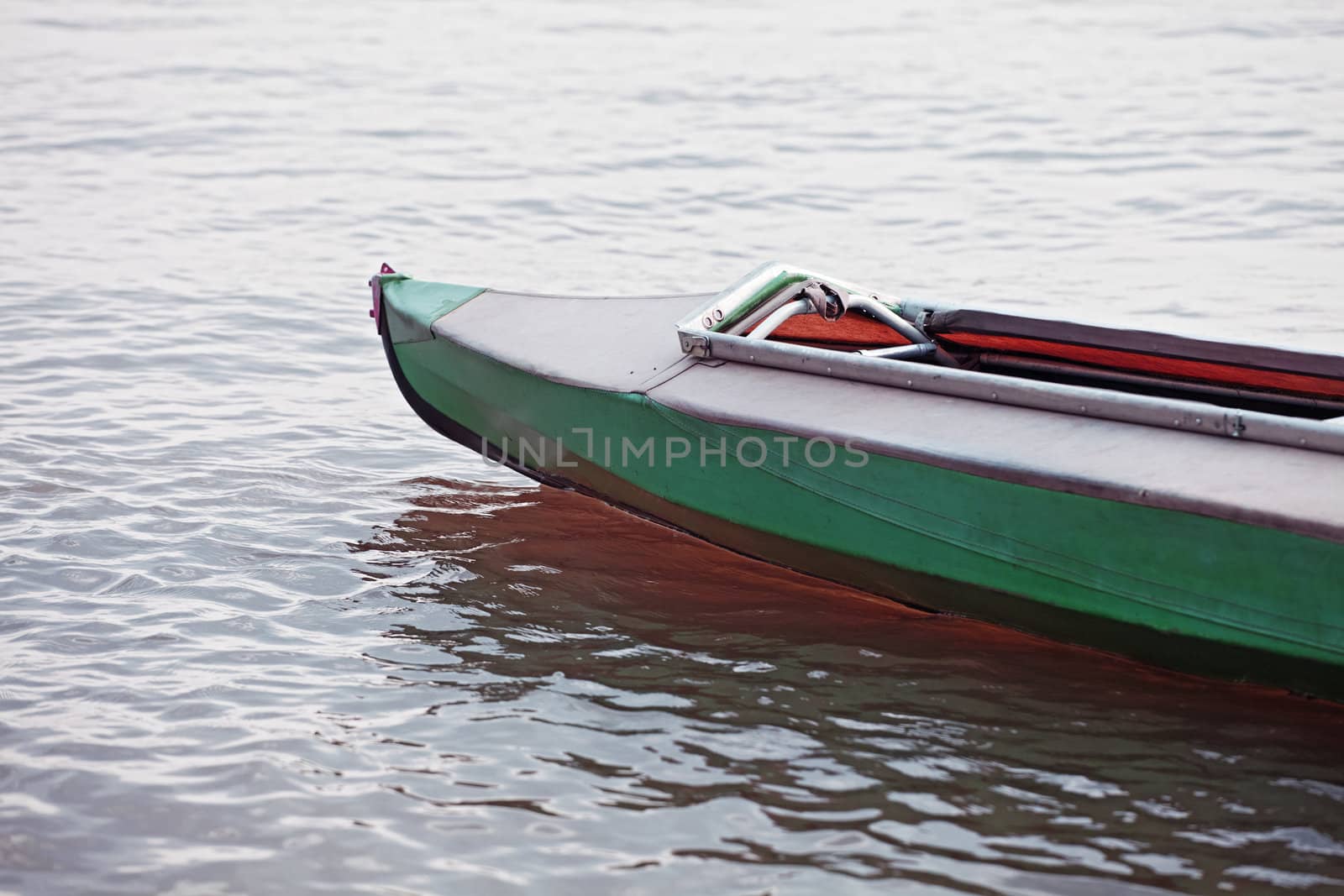 Canoe on still water of a lake