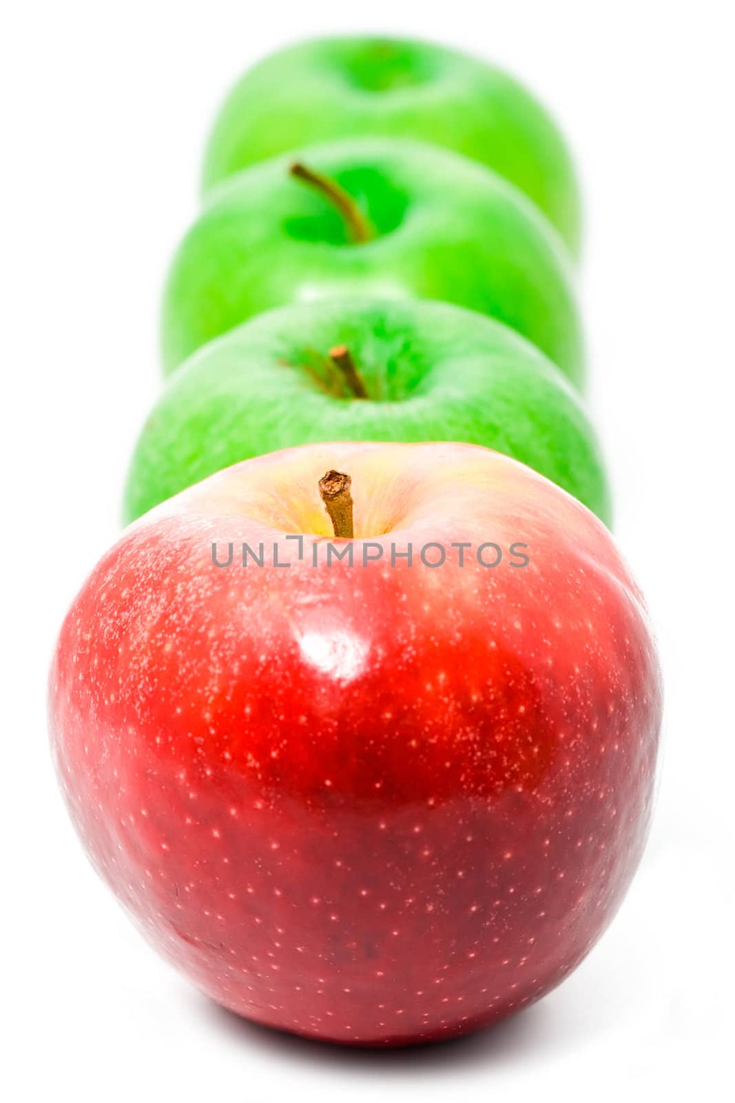 Red and green apples on white