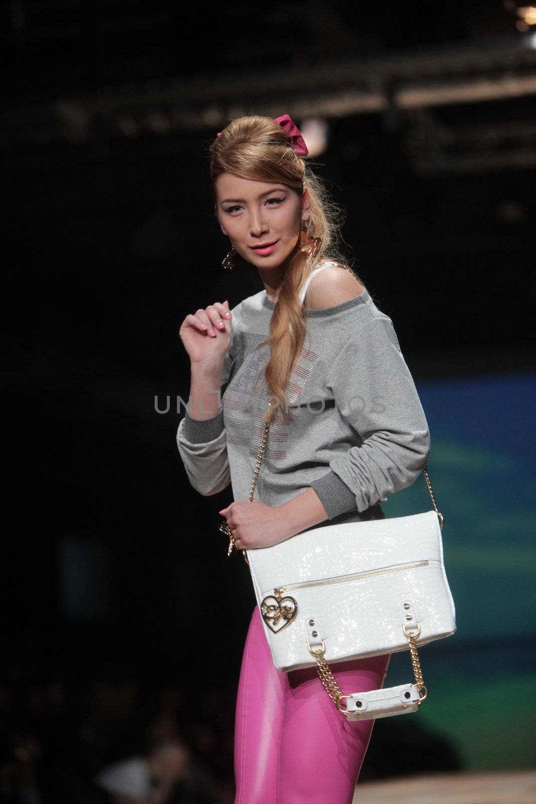 ZAGREB, CROATIA - MARCH 23: Fashion model wears clothes made by ELFS on "CRO A PORTER" show on March 23, 2012 in Zagreb, Croatia.