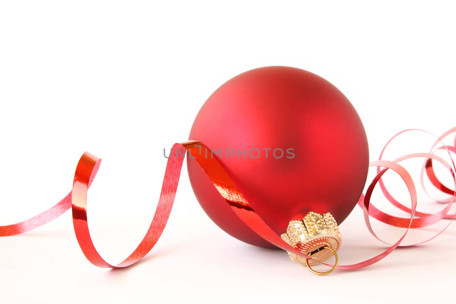 Red Christmas ball with a tape
