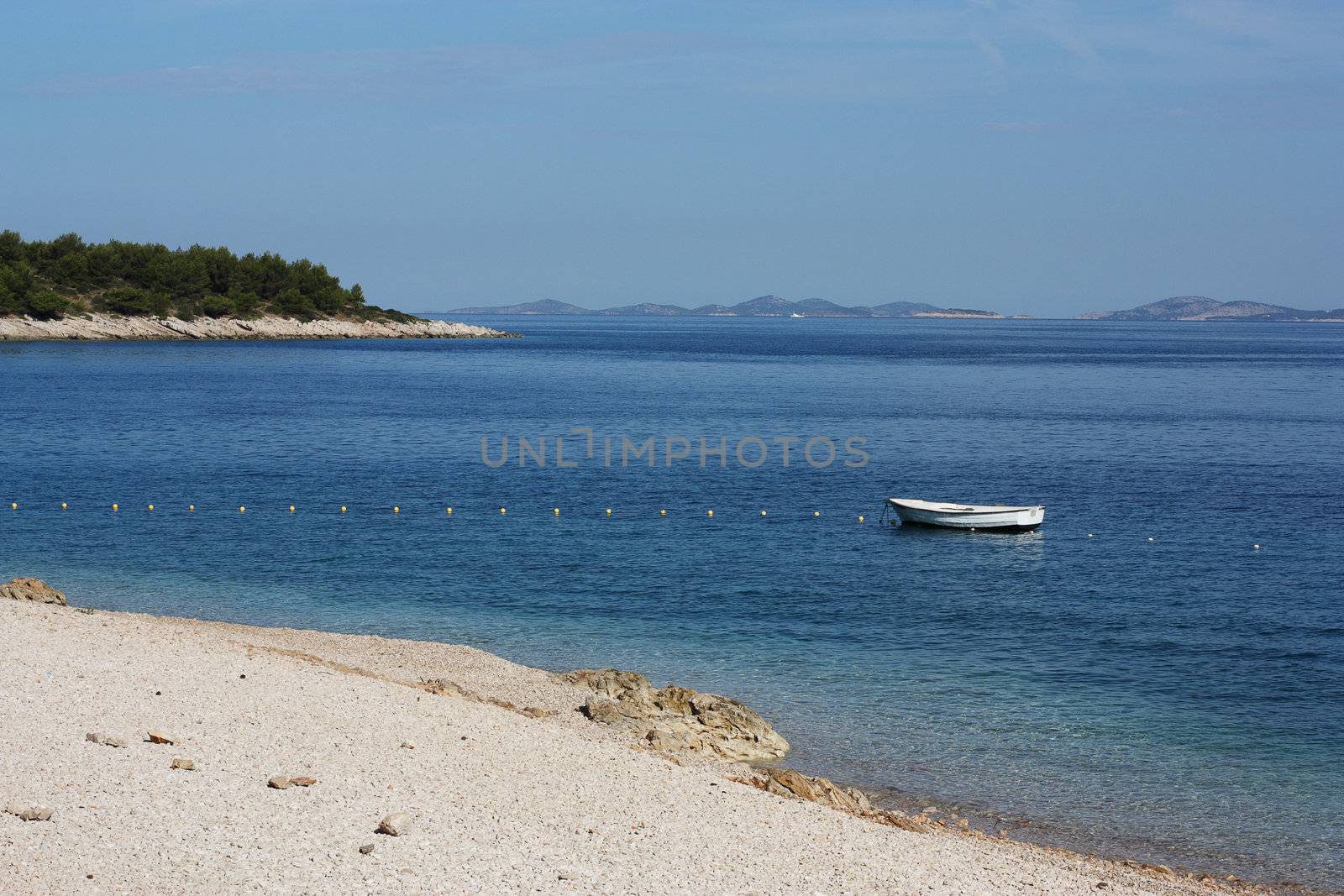 Seascape with a boat. Adriatic Sea