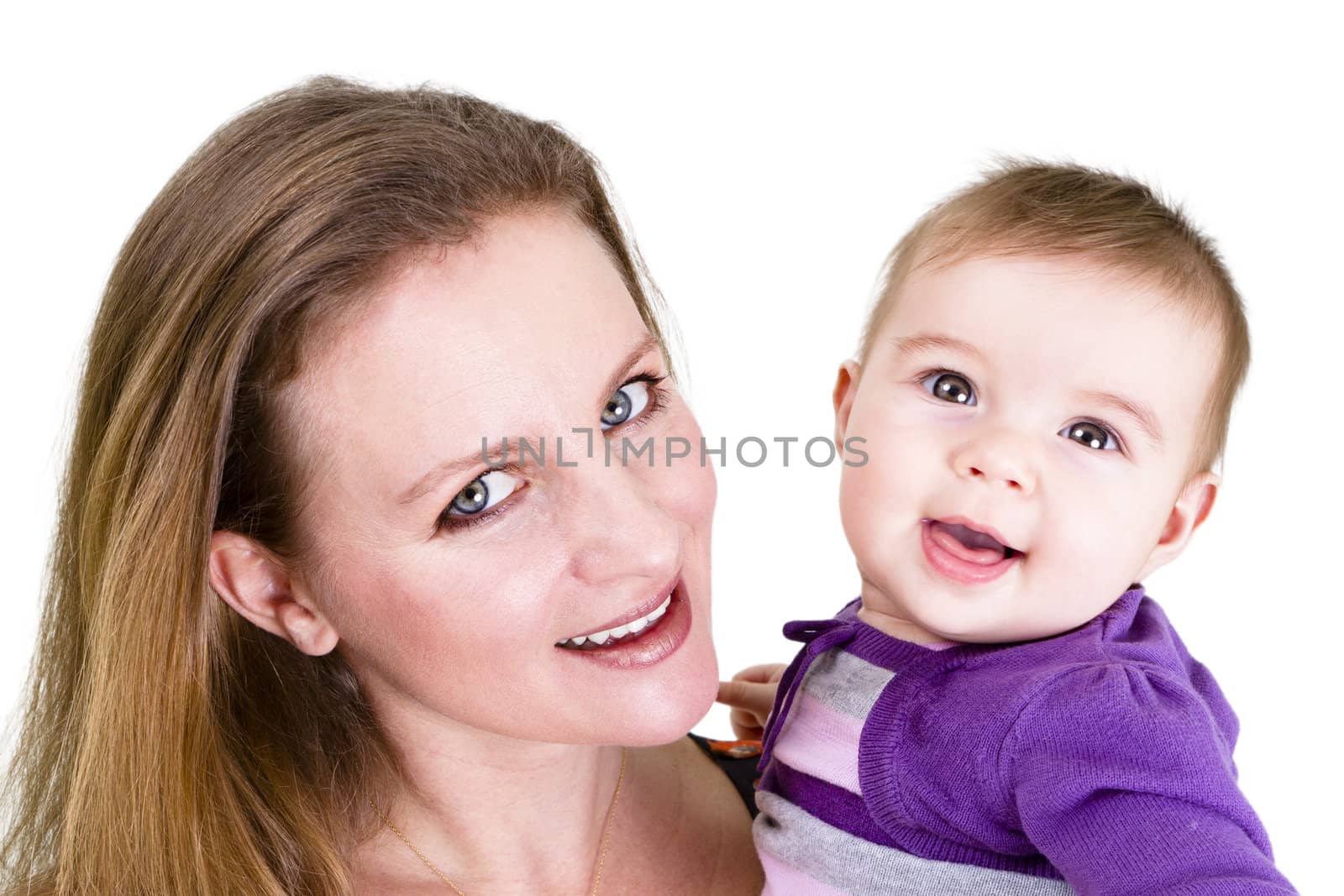 Pretty young mother and her cute baby posing.