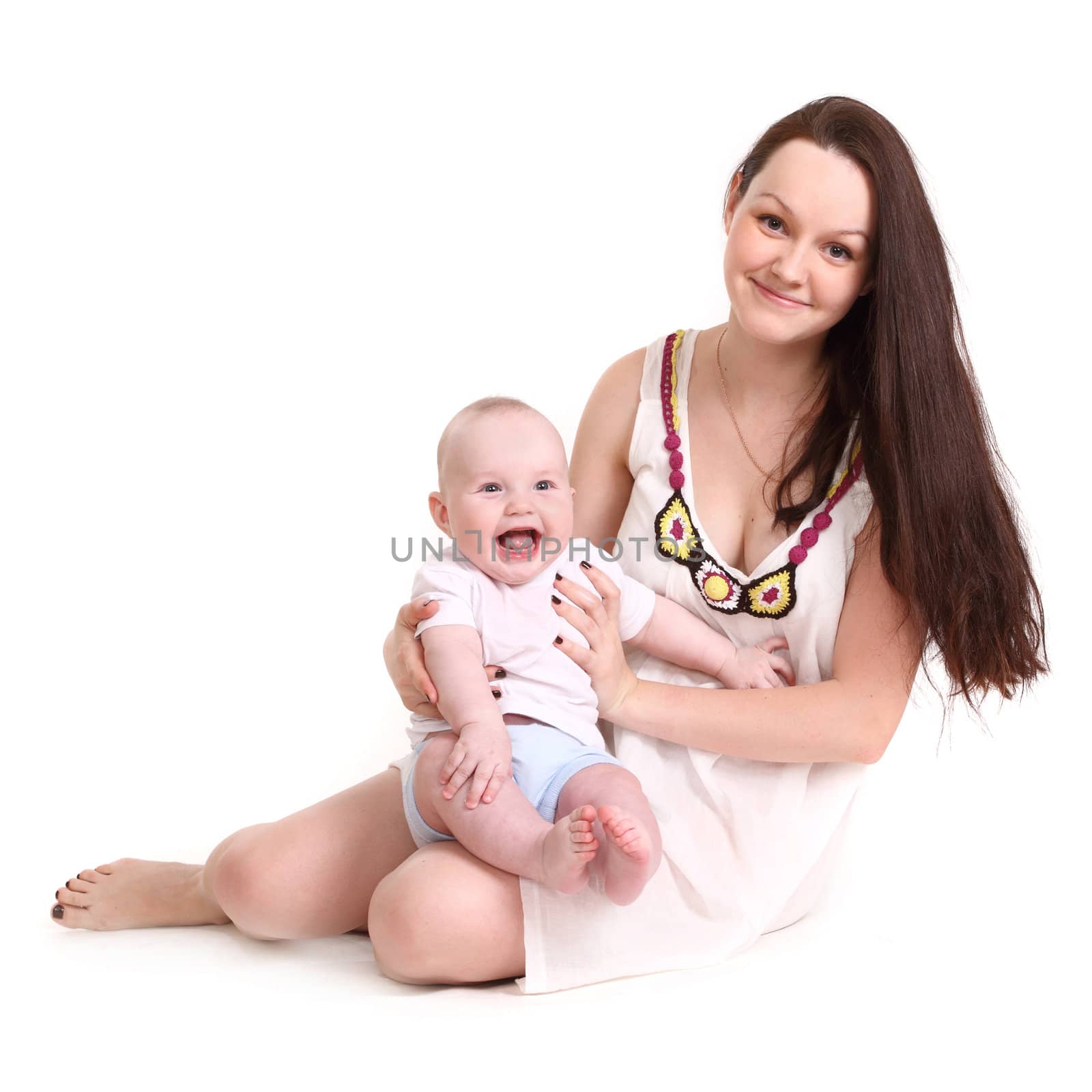 Young mum and the small son, portrait on a white background close up, the kid sits at mum in a lap, mum holds the kid, a format square