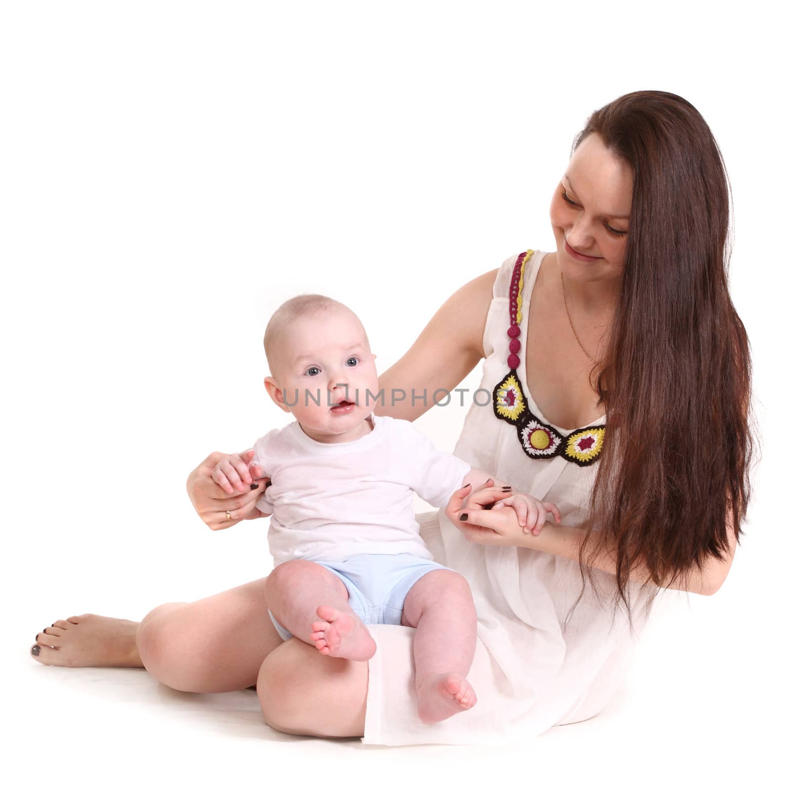 Young mum and the small son, portrait on a white background close up, the kid sits at mum in a lap, a format square.