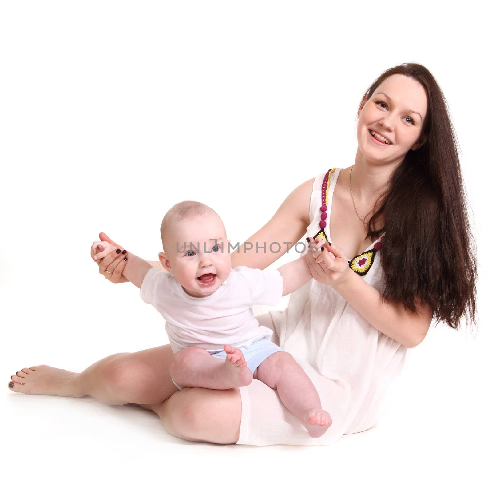 Young mum and the small son, portrait on a white background close up, the kid sits at mum in a lap, mum holds the kid for hands, a format square