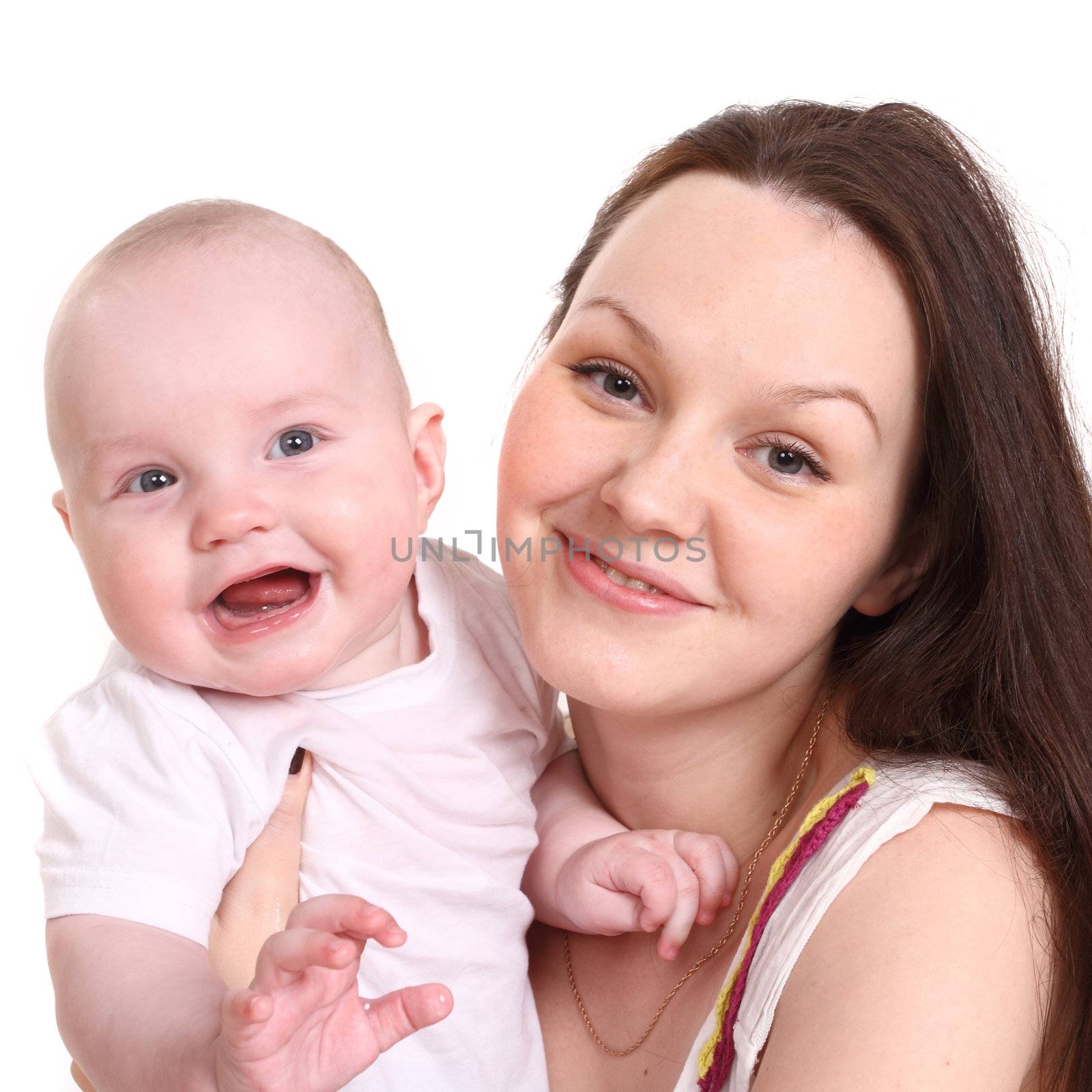 Young mum and the small son, portrait on a white background close up, the kid smiles, a format square.