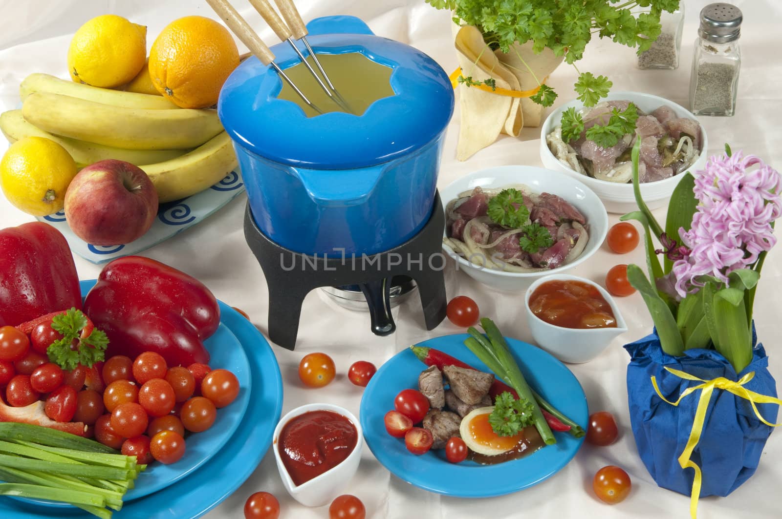fondue with meat and vegetables