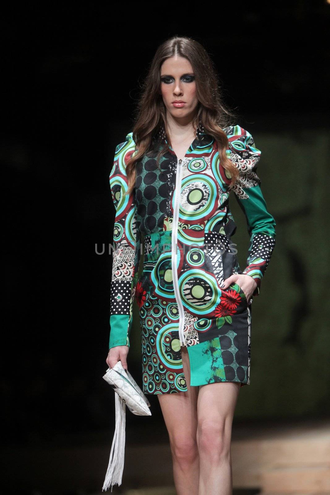 ZAGREB, CROATIA - MARCH 23: Fashion model wears clothes made by Monika Sablic on "CRO A PORTER" show on March 23, 2012 in Zagreb, Croatia.