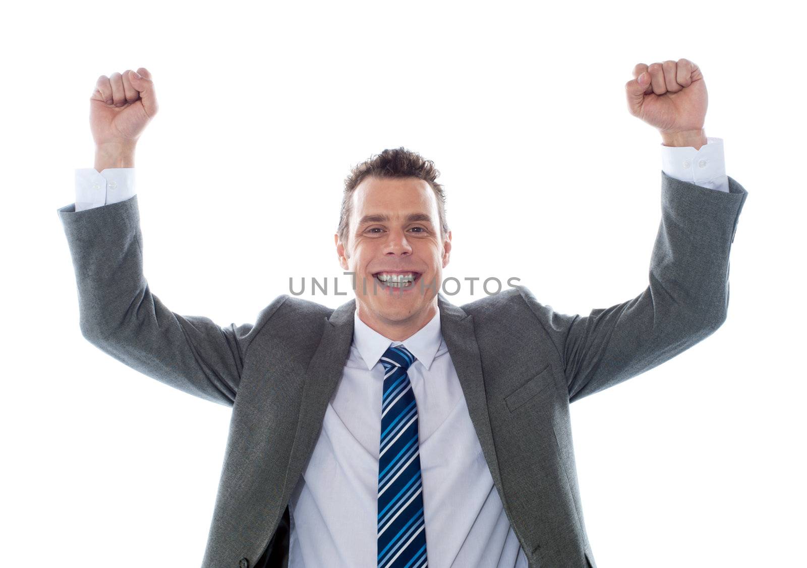 Cheerful excited business executive by stockyimages