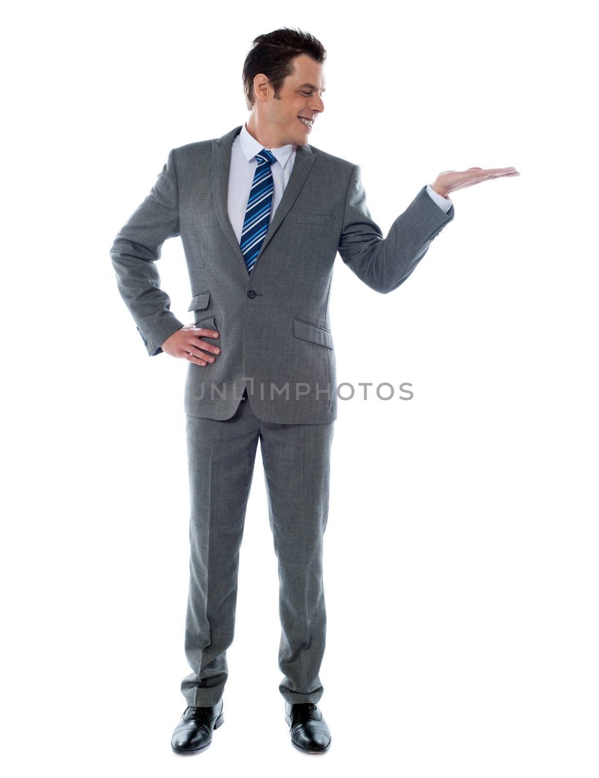 Happy businessman giving presentation on white background