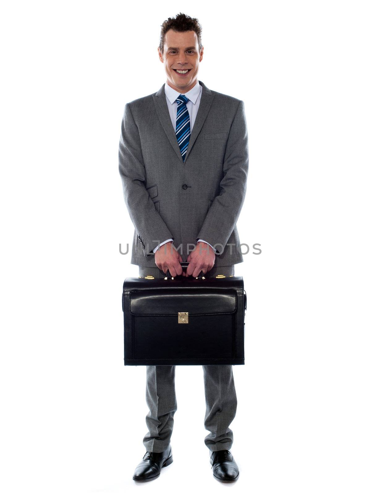 Comany's CEO holding his handbag in front of camera