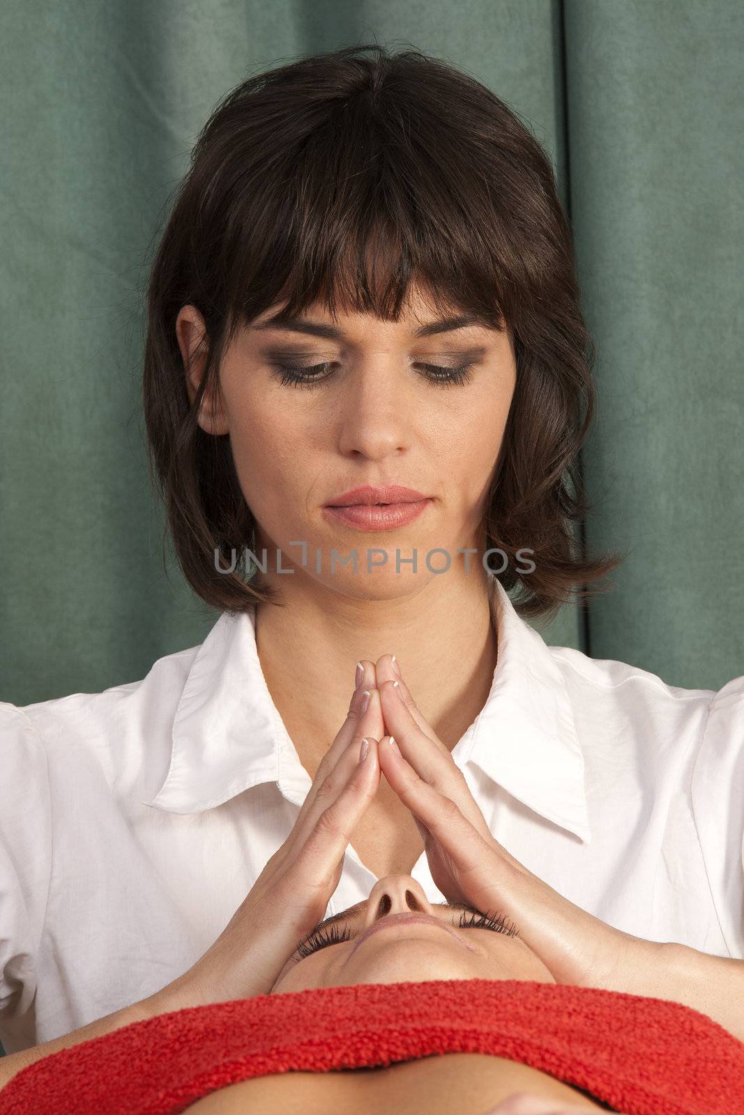 Young woman is treated with meditation