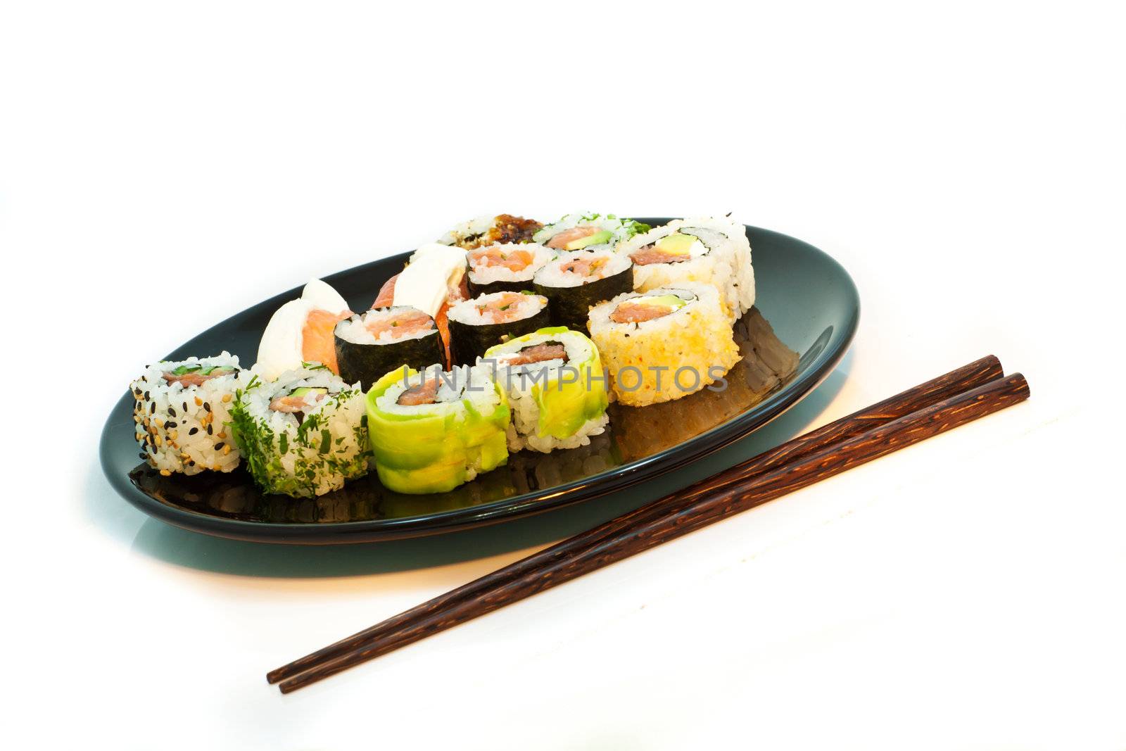 Sushi set in a black plate with chopsticks by Lamarinx
