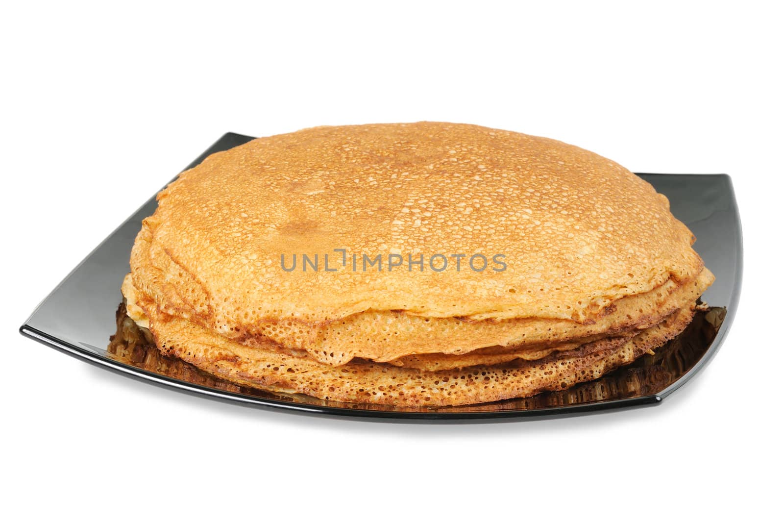 Pancakes on a plate. Isolated on white