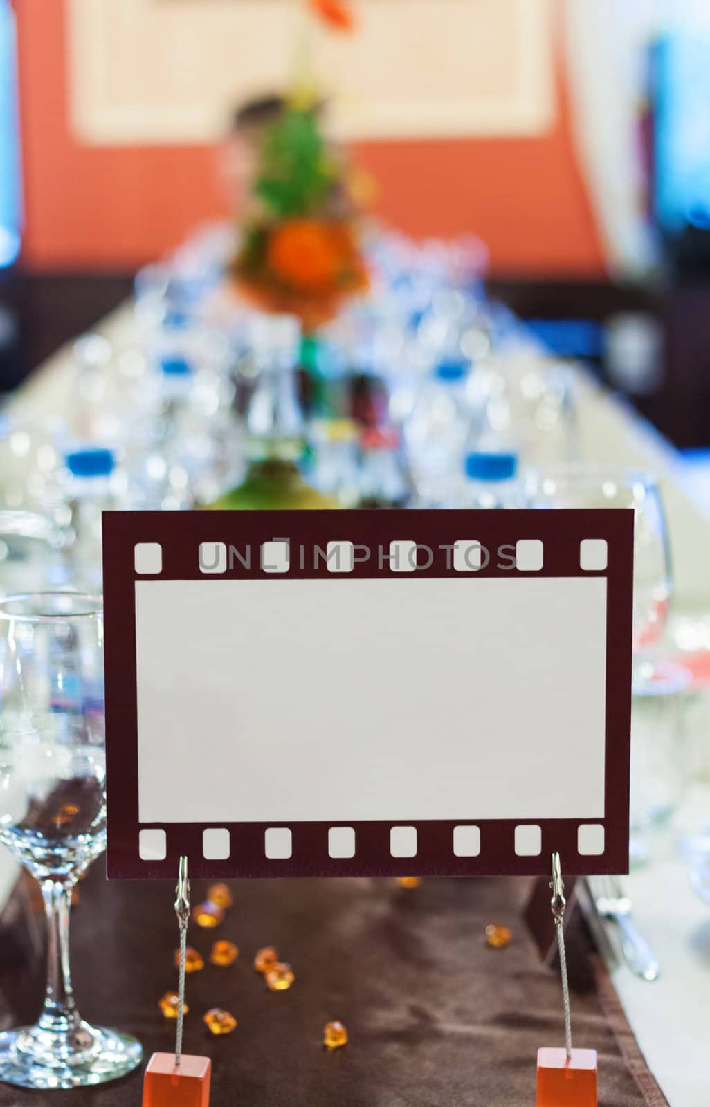 Movie film sign for an official dinner table