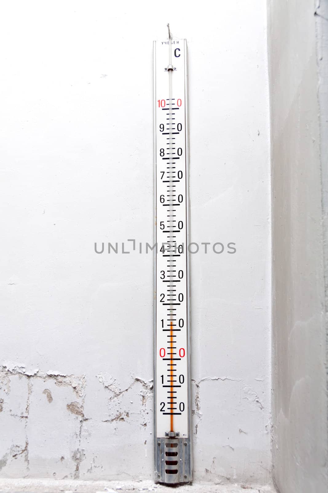 Old thermometer on an old wall by Lamarinx