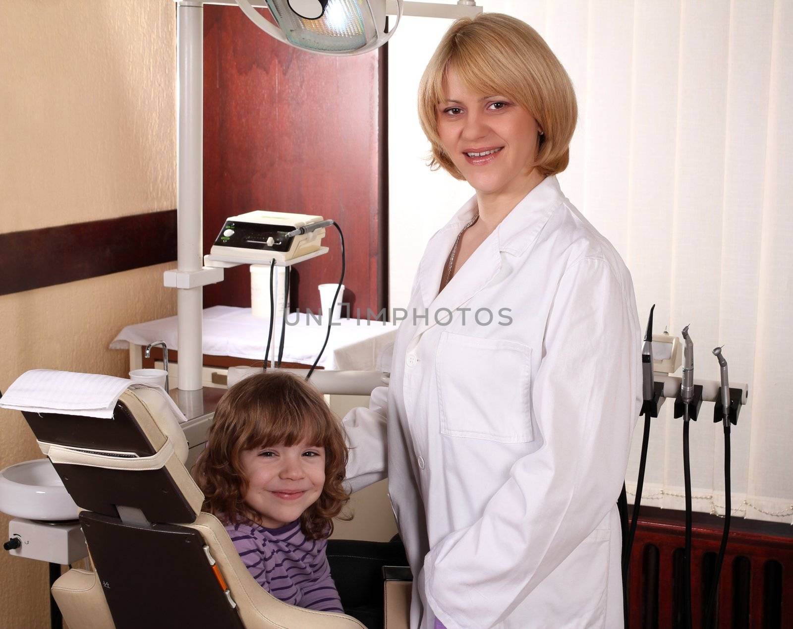 dentist and little girl by goce