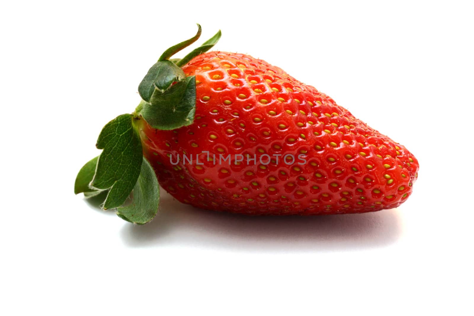 single red strawberry isolated on white background