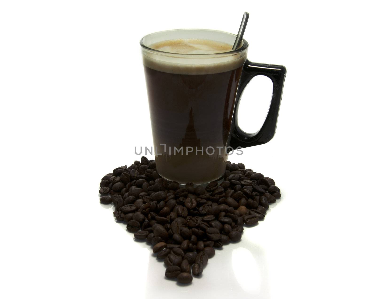 coffee with milk and beans in heart shape