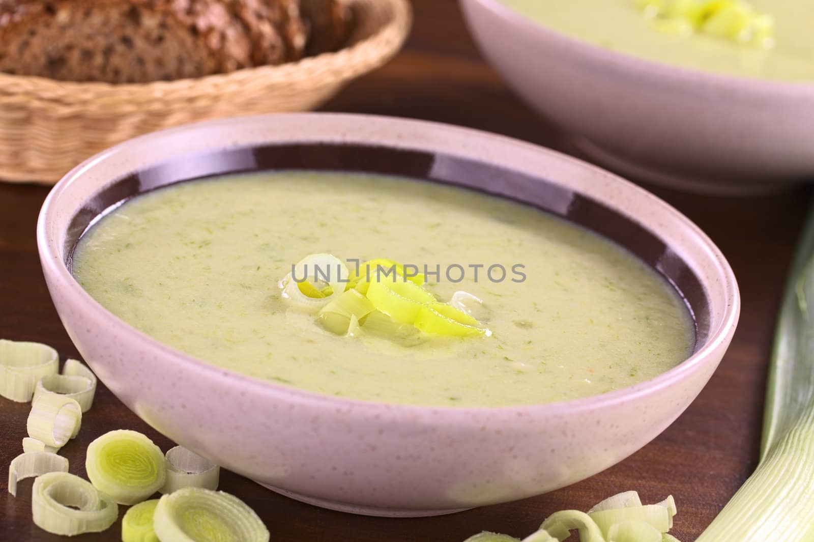 Fresh homemade leek soup (Selective Focus, Focus on the leek rings on the top of the soup)