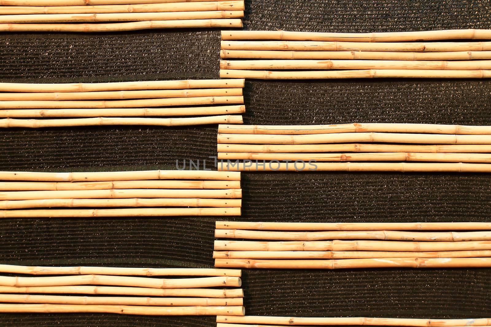 background of bamboo sticks 
 by rufous