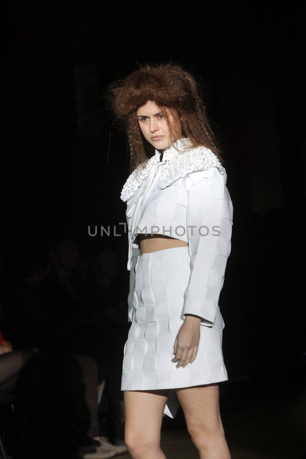 ZAGREB, CROATIA - MARCH 21: Fashion model wears clothes made by Madame Demode and Tamara Bombardelli on "CRO A PORTER" show on March 21, 2012 in Zagreb, Croatia.