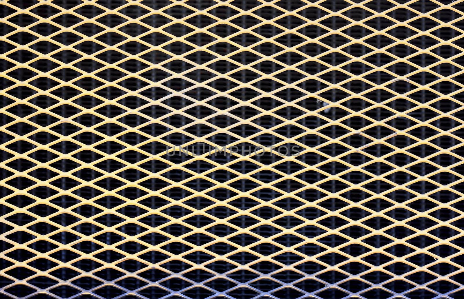 metal background with perforated holes by rufous