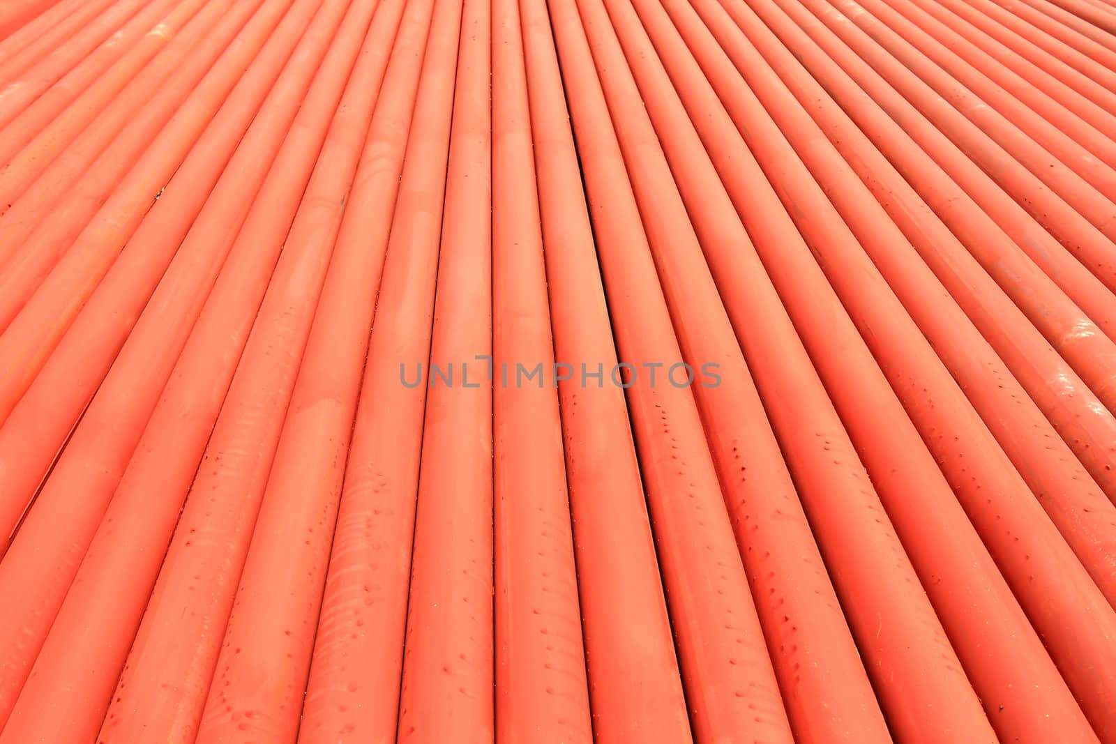 Stack of metallic pipes in a construction site