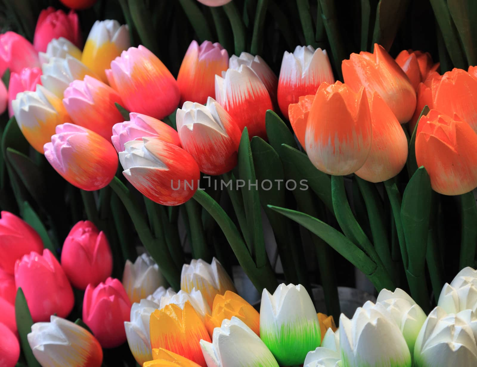 Image of colorful wooden tulips on a market stand in Amsterdam.