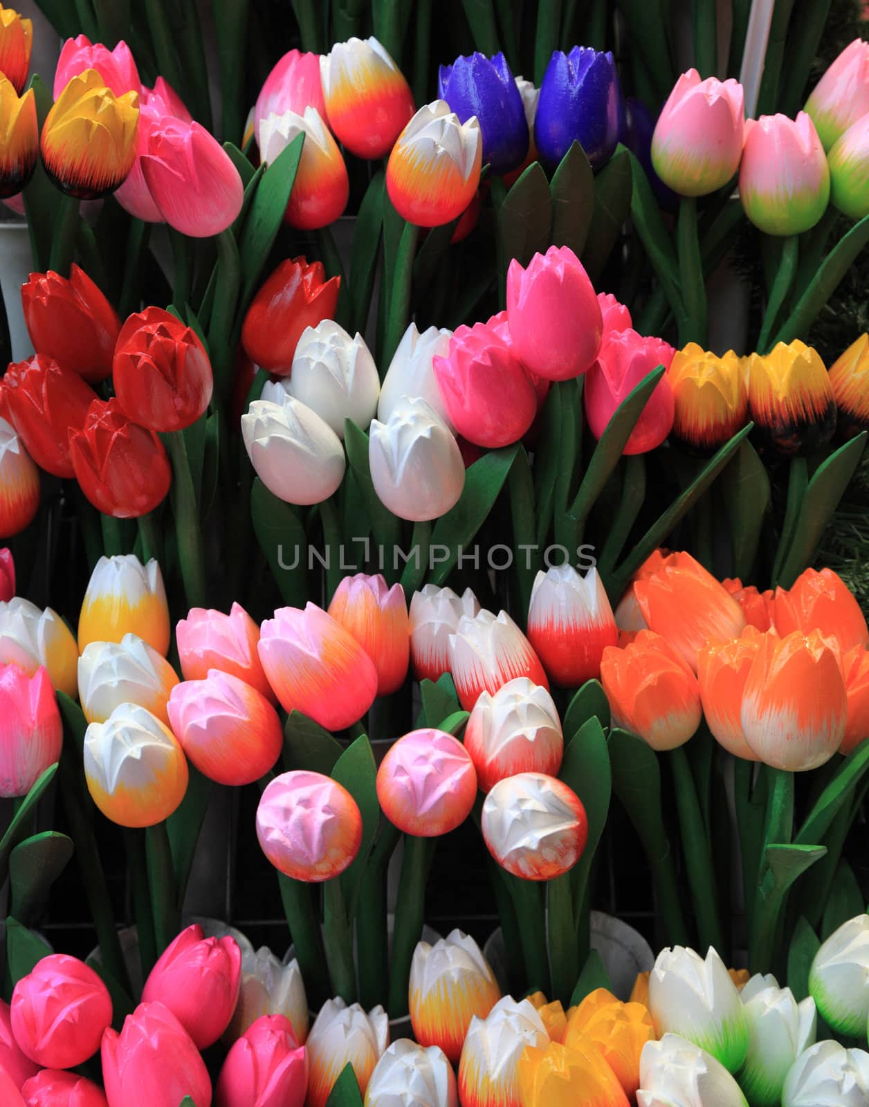 Image of colorful wooden tulips on a market stand in Amsterdam.